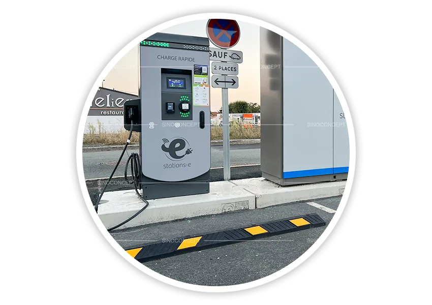 1830 mm wheel stop used near an EV charging point to help align vehicles and protect equipment