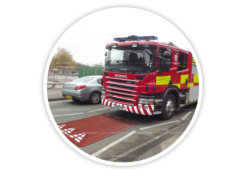 Traffic calming speed cushions designed for smooth bus and emergency vehicle passage while slowing down smaller cars