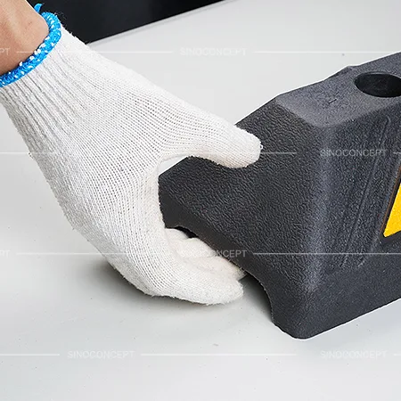 Wheel stops featuring convenient handles on both ends for easy carrying and positioning during installation