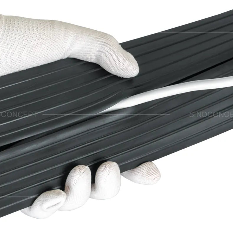 Top view showing the slit of the 1-channel floor cable cover, designed for easy cable placement