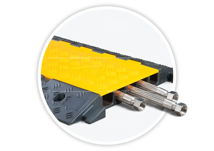 Close-up of 5-channel cable ramp with cables entering the channels under yellow lid