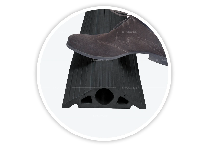 Cable ramps and cable protectors 3-channel floor cable cover with foot press, designed for protecting cables with a durable black base and reliable load support