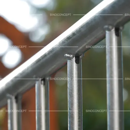 Crowd control barriers with durable steel structure and wide legs for stability in busy pedestrian areas