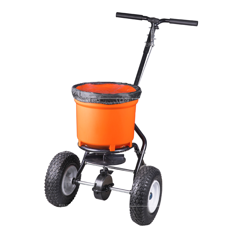 25L walk behind salt spreader with pneumatic tyres and round hopper for winter gritting applications