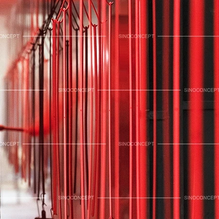 Expandable safety barriers powder coating line showing red finish for outdoor corrosion protection