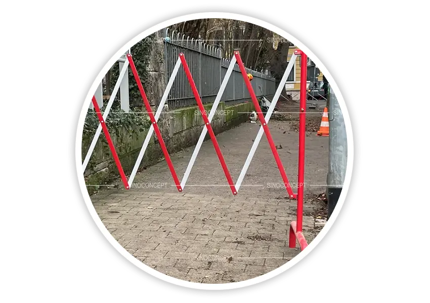 Expandable safety barriers used to block a footpath during maintenance and temporary work zones