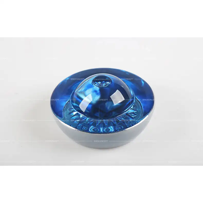 Large glass road stud in blue for parking and restricted area marking applications