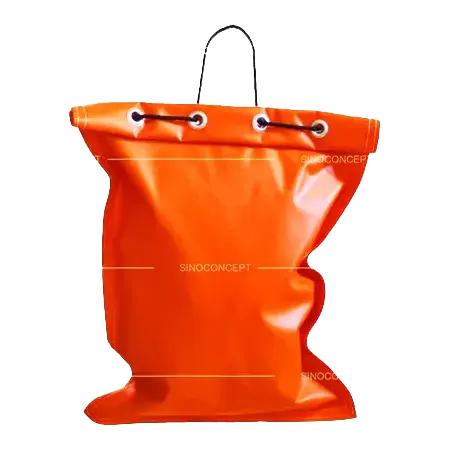 Heavy-duty orange PVC sandbag with reinforced seams, metal eyelets and carrying handle for easy transport, ideal for traffic safety and construction site ballast