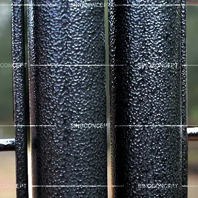 Close-up of grey hammered powder coating on gridwall panels frame