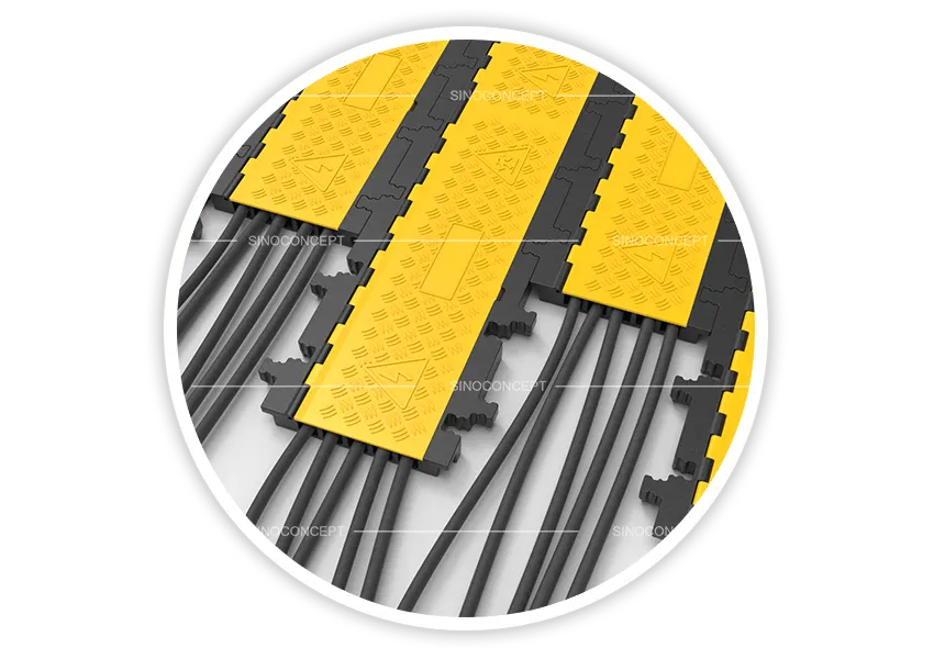 5-channel modular cable ramp protecting multiple cables, featuring an interlocking modular design for extended cable routing