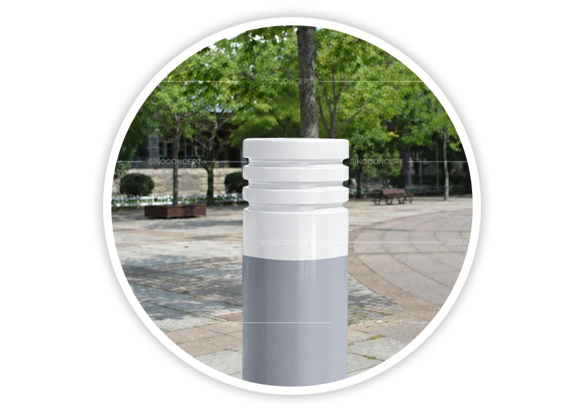 Grey 3-Groove Bollard with white DDA-compliant top installed in pedestrian area
