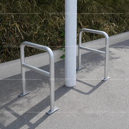 Hoop barriers and lamp post protectors installed around lamp post for fixed structure protection
