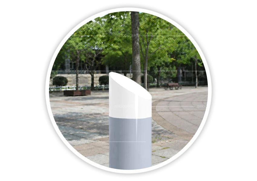 Grey mitre-top bollards with white angled tops for pedestrian area access control