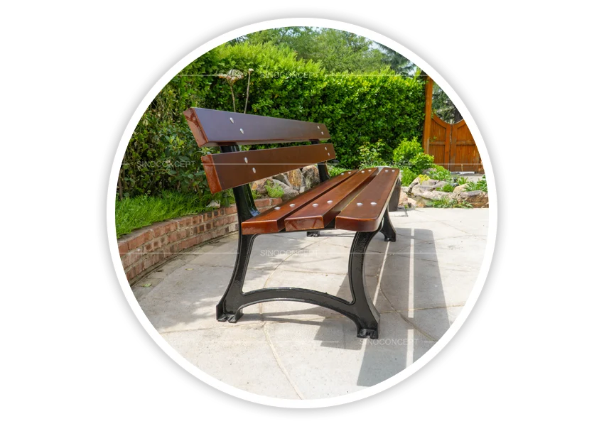Outdoor benches and seating side view showing wooden slats and cast iron support legs outdoors