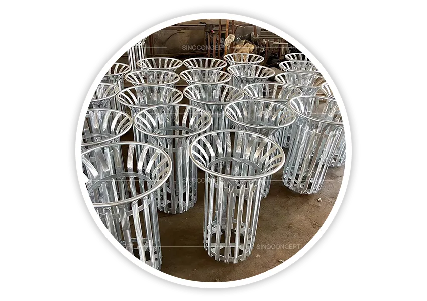 Batch of hot-dip galvanised outdoor litter bins stacked in the factory for corrosion-resistant outdoor use