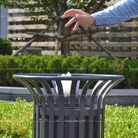 Tulip-style outdoor litter bin installed in a public space for fixed outdoor waste collection